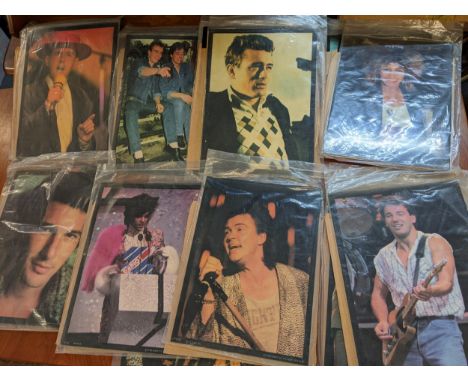 Folio of Paramount pop poster board multiples with varied 1980's artists includes: Bronski Beat, Go West, Bruce Springsteen, 