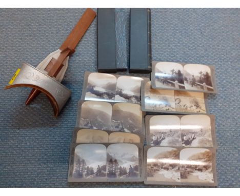 A vintage treen stereoscope and slides Location: RWM 