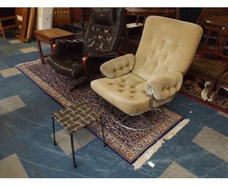 A 1970's Chromed Base Swivel Armchair with Vintage Stool 