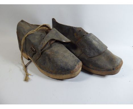 A Pair of Vintage Wooden and Iron Soled Clogs 