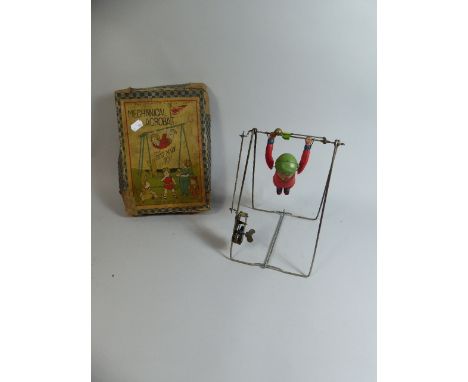 A Vintage Mechanical Acrobat Toy  