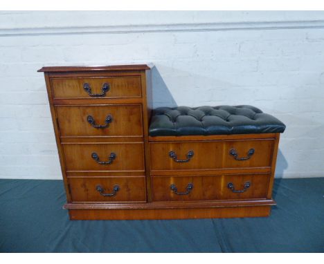 A Yew Wood Telephone Seat with Button Upholstered Top, Drawers and Cabinets, 95cm long 