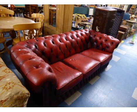 A Vintage Buttoned Red Leathered Upholstered Three Seater Chesterfield Settee 