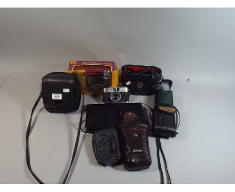 A Tray Containing Vintage Cameras and Pair of Binoculars