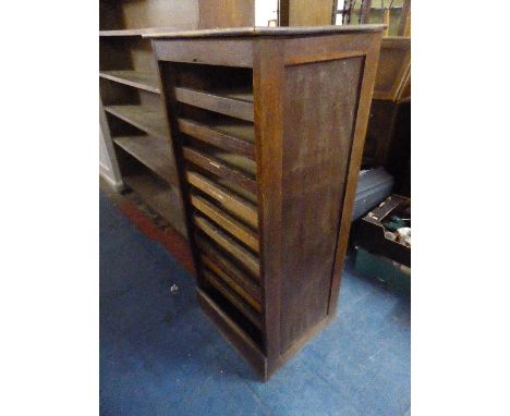 An Oak Nine Slide Edwardian Cabinet, Missing Tambour Roller Front