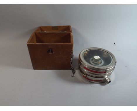 A Cased Chrome Pigeon Clock  