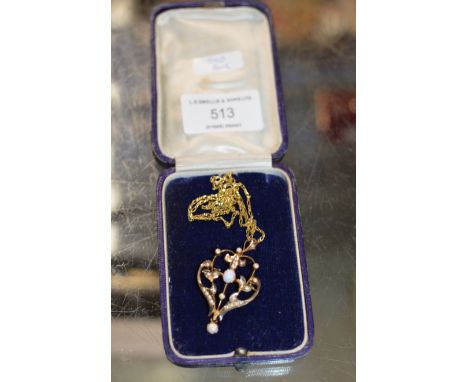 ART NOUVEAU STYLE 9 CARAT GOLD OPAL EFFECT PENDANT ON 9 CARAT GOLD CHAIN - APPROXIMATE WEIGHT - 5.4 GRAMS     