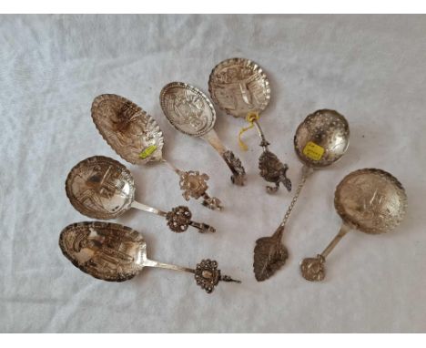 A group of seven Dutch caddy spoons with embossed bowls