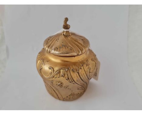 A 19th Century French silver gilt baluster shaped tea caddy and cover, 4" high