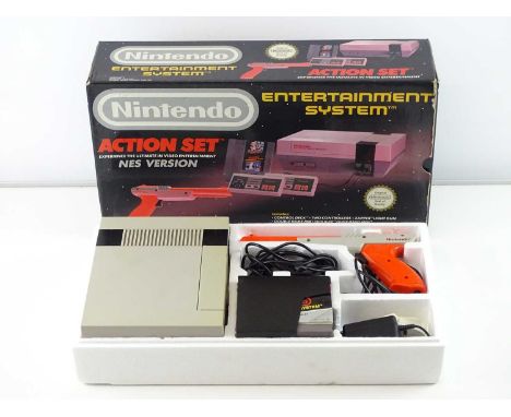 Nintendo Entertainment System (NES) video game console/'Control Deck' Action set - including two controllers, Zapper light gu