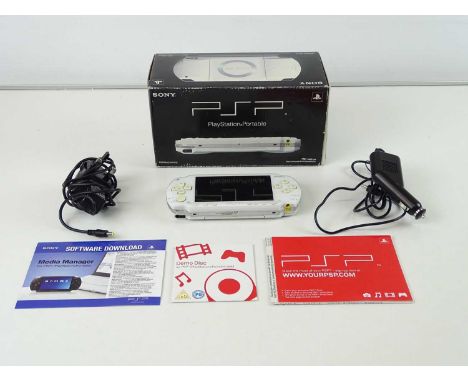 Playstation Portable 'Ceramic White' colour - released in 2004 - PSP-1003CW - in original box, appears complete but missing t