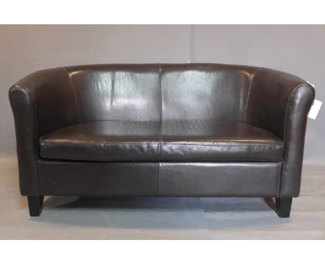 A two seater faux leather sofa, on tapered block feet, H.75 W.142 D.70cm 