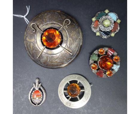 A collection of Celtic design brooches, to include semi-precious stone set example (4) 