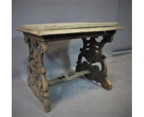 A carved console stool with floral fabric upholstery 20th century, H.50x W.64 x D.43cm 