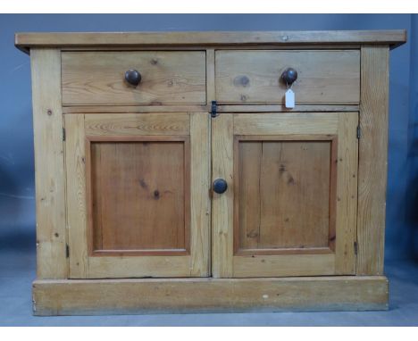 A pine two door sideboard, fitted drawers, W 120cm, D43cm, H88cm&nbsp;