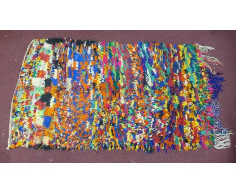 A vintage Moroccan Berber Boujaad rug, with multi-coloured design, 185 x 107cm 