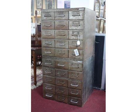 Two 1950's metal filing cabinets, each with an arrangement of 15 drawers, H.72 W.69 D.66cm 