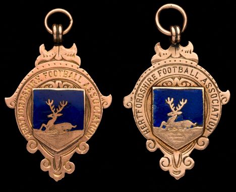 Two Hertfordshire Football Association Charity Cup medals won by a Barnet & Alston player in seasons 1911-12 & 1913-14,both i