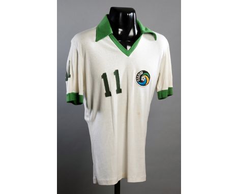 Signed Steve Hunt Cosmos No.11 jersey from the 1977 Championship season,white & green trimmed short-sleeved jersey, numbered 