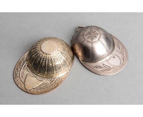 Two hallmarked silver jockey cap caddy spoons,one with a Birmingham hallmark, the other stamped .925