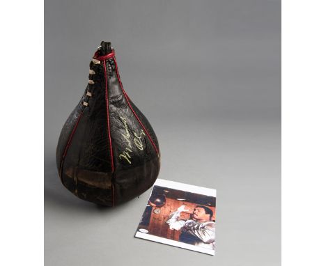 Muhammad Ali used and signed Everlast speed bag from his training camp in Deer Lake, Pennsylvania while preparing for the Lar