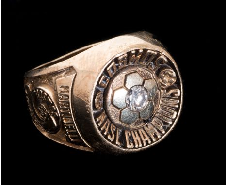 The 1978 NASL Soccer Bowl Championship Ring awarded to the New York Cosmos equipment manager Charles Martinelli,10k gold set 