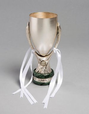 A Real Madrid player's trophy for the 2016 UEFA Super Cup,in the form of a miniature metallic replica of the tournament troph
