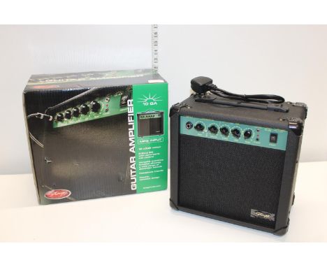 A boxed Stagg 10 GA amplifier 