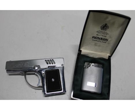 A boxed Ronson lighter &amp; novelty Aurora 45 lighter 