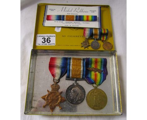 Trio of medals with mess uniform miniaturesThe name on the medals is Lieut. H K Wadams