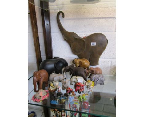 Collection of elephants to include a small brass, wooden & ceramic examplesProcedes to South Worcestershire (Wychavon) Citize