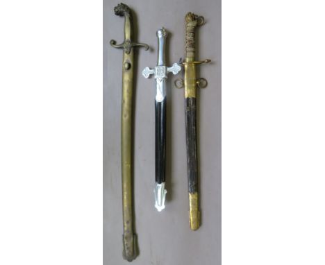 [AP] TWO BANDSMANS SWORDS AND A VICTORIAN NAVAL DIRK the first of the Honourable Artillery Company, circa 1890, with brass hi