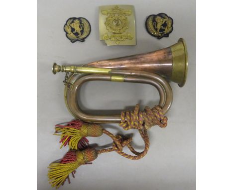 MISCELLANEOUS ASSORTED ITEMS OF MILITARY INTEREST A copper bugle with brass mounts, inscribed ~MAHAJAN DOGRAS BUGLE WHICH RAI