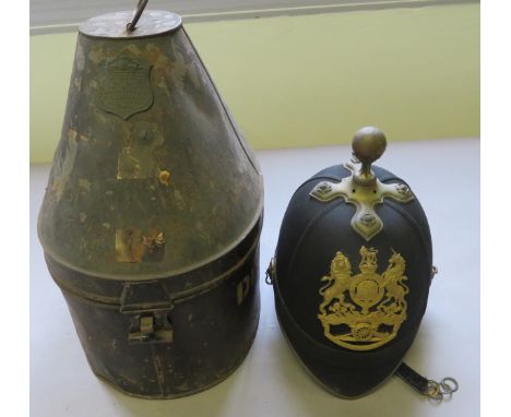 [AP] AN OFFICER~S HELMET OF THE ROYAL ARTILLERY, CIRCA 1902-14 a good example by Hawkes, complete with ball ornament and base