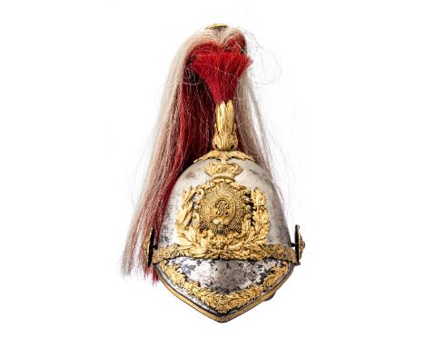 [AP] AN 1847 PATTERN OFFICER~S HELMET OF THE INNISKILLING DRAGOONS with white metal skull with gilt fittings, part of gilt de