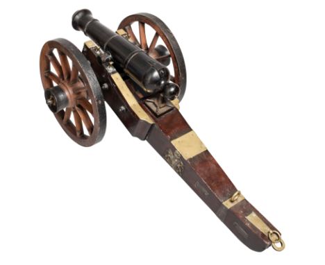 ˜A VICTORIAN SALUTING CANNON, SECOND HALF OF THE 19TH CENTURY  with iron barrel formed in four tapering stages with raised as