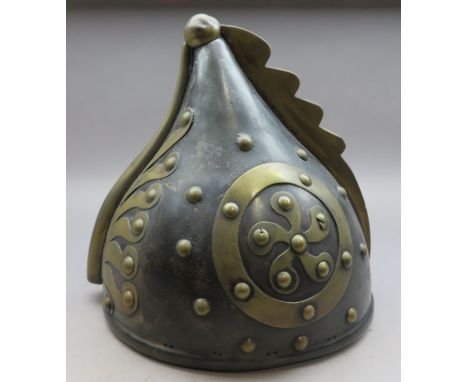 [WP] A BRASS-MOUNTED IRON HELMET, 20TH CENTURY, PROBABLY FOR THEATRICAL USE of loose classical design, with pear-shaped skull
