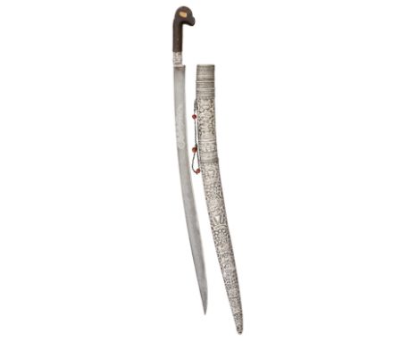 ˜AN OTTOMAN SHORTSWORD (YATAGHAN), DATED 1215 AH (CIRCA 1800)with curved single-edged blade inlaid with the bladesmith~s name