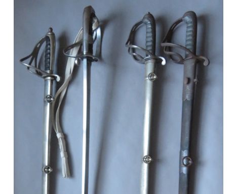 [AP] A VICTORIAN OFFICER~S SWORD, LATE 19TH CENTURY, ANOTHER AND TWO ARTILLERY OFFICER~S SWORDS of regulation type, the first