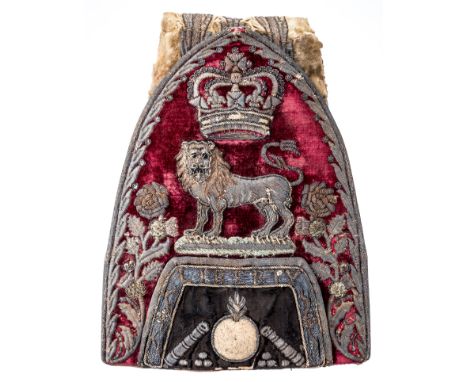 A HIGHLY INTRIGUING AND UNIQUE OFFICER~S MITRE CAP, MID-18TH CENTURY the stiffened front of crimson velvet bearing a lion sta