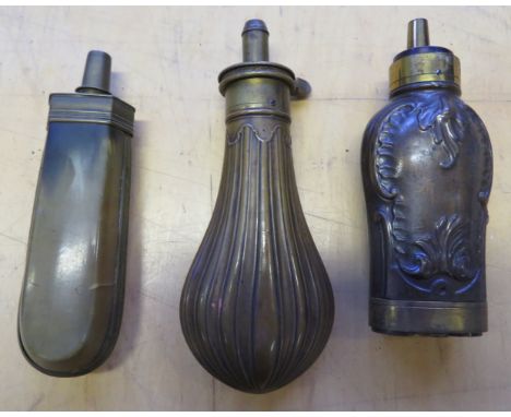 ‡ A THREE-WAY POWDER-FLASK, A SMALL POWDER-FLASK, SECOND QUARTER OF THE 19TH CENTURY AND A FRENCH PISTOL FLASK, EARLY 19TH CE