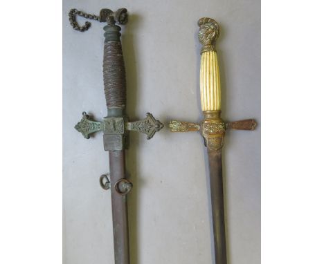 TWO AMERICAN SOCIETY SWORDS, LATE 19TH CENTURY the first with etched blade decorated with scrollwork and the federal eagle, b