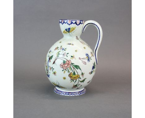 An early 20th century Gien faience jug, H.23 cm.