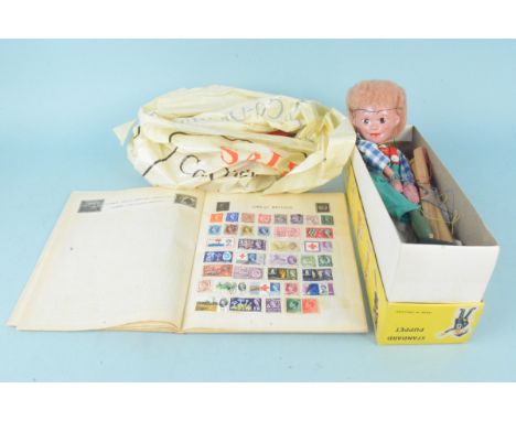 A vintage Pelham puppet 'Hansel' plus a selection of loose stamps and album