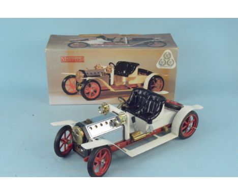 A boxed vintage Mamod steam roadster with accessories, approx 39cm long (evidence of use on engine)