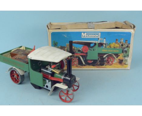 A boxed Mamod steam wagon with accessories, 39cm long (engine appears unused but box with stains and wear)