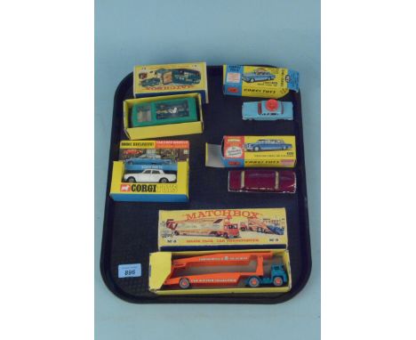 Five boxed vintage Corgi and Matchbox vehicles including M-8 car transporter, racing car transporter, Mercedes Benz 600 Pullm