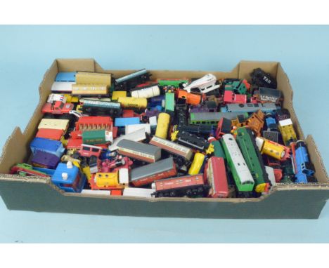 A quantity of model vehicles to include cars, buses and trains by various makers to include ERTL, Corgi etc