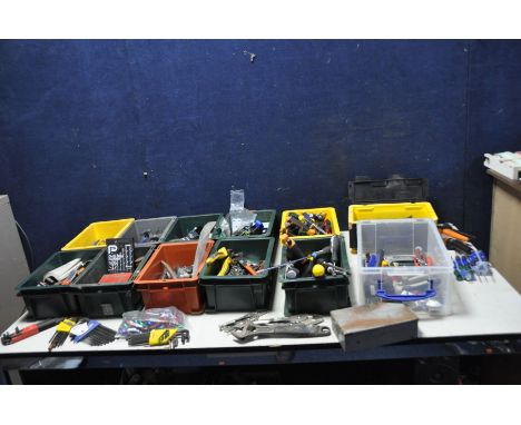 ELEVEN LAND ROVER AND BEL STORE BINS AND ANOTHER TRAY CONTAINING TOOLS including Fiskars and other secateurs, vice grips, scr