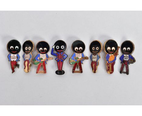 EIGHT ROBERTSONS GOLDEN SHRED MASCOT BROOCHES, to include a guitar player, bagpipe player, tennis player, and others, each fi